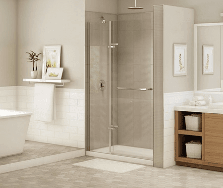 A modern, neutral-toned bathroom featuring a walk-in glass shower enclosure, a bathtub, and an open wooden vanity.
