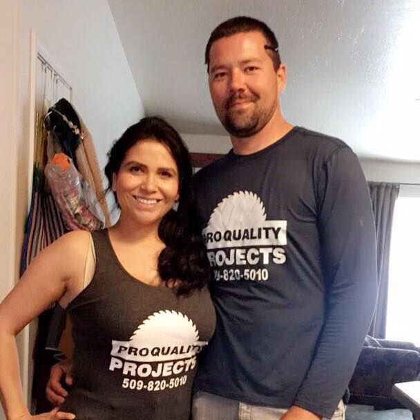 Man and woman in matching shirts with 