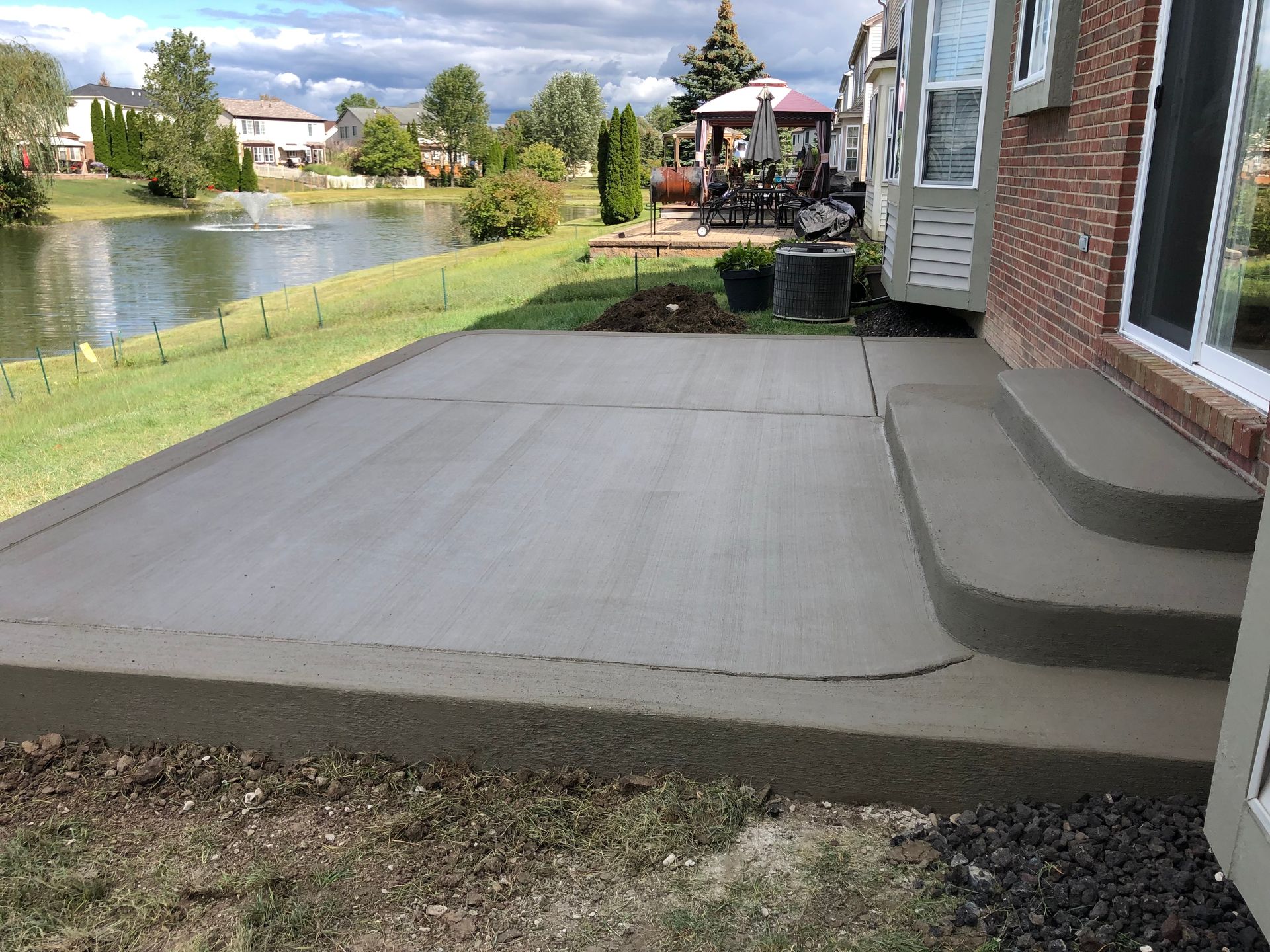 Poured steps Exposed Aggregate patio