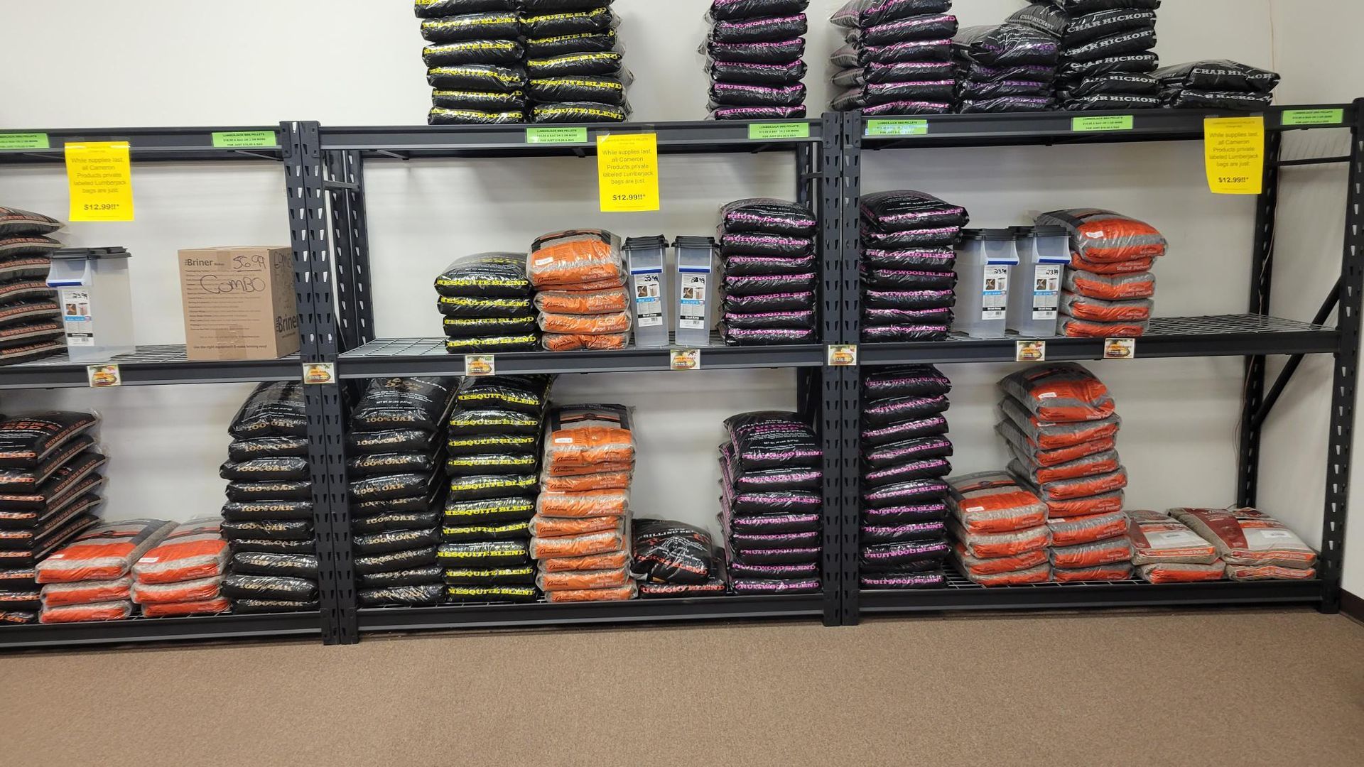Shelves filled with lots of bags of food including carrots