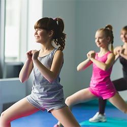 Girls Doing Yoga — Big Kids in Woodridge, IL