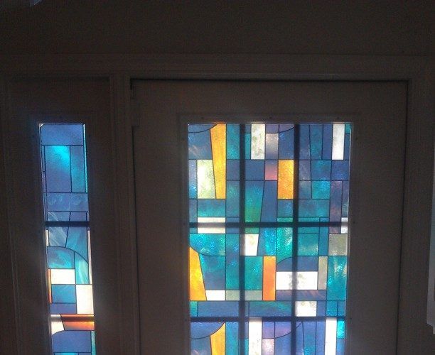 A door with a stained glass window in it