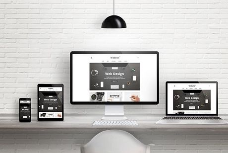 Website displayed on smartphone, tablet, laptop and desktop
