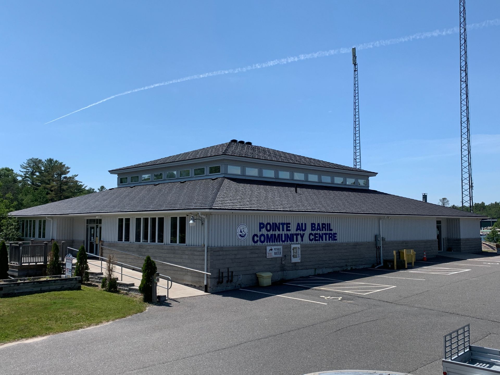 A large building with a sign on the side that says community centre
