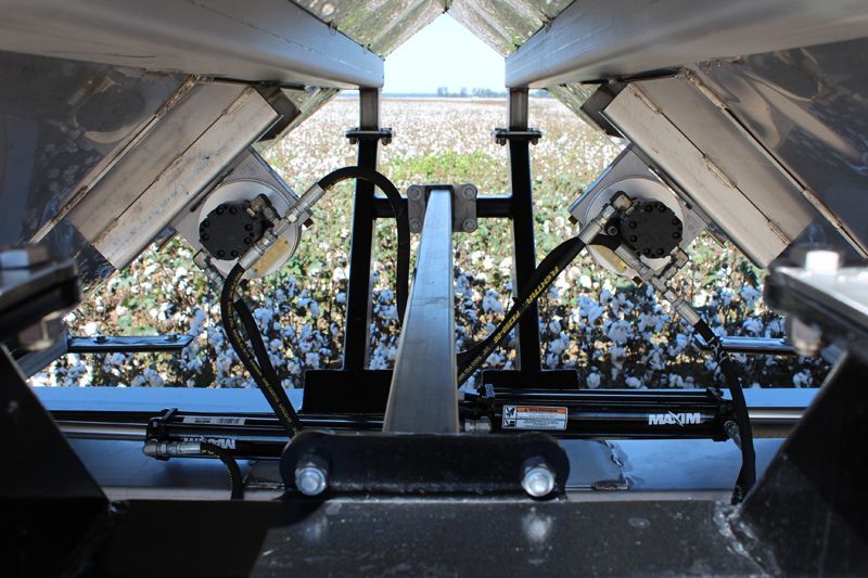A view of a cotton field from the inside of a machine