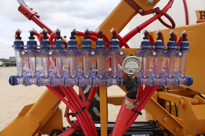 A close up of a machine with a bunch of wires coming out of it