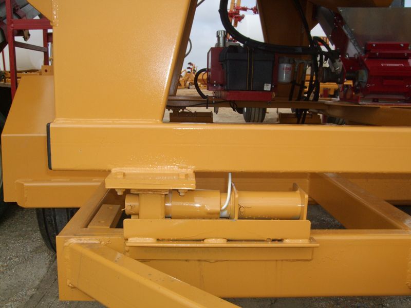 A close up of the side of a yellow vehicle