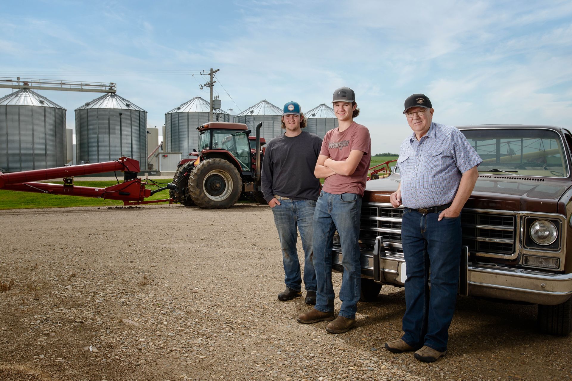 Kael, Rhett and Bryan Perkins on Perkins Farm in Wainwright, Alberta