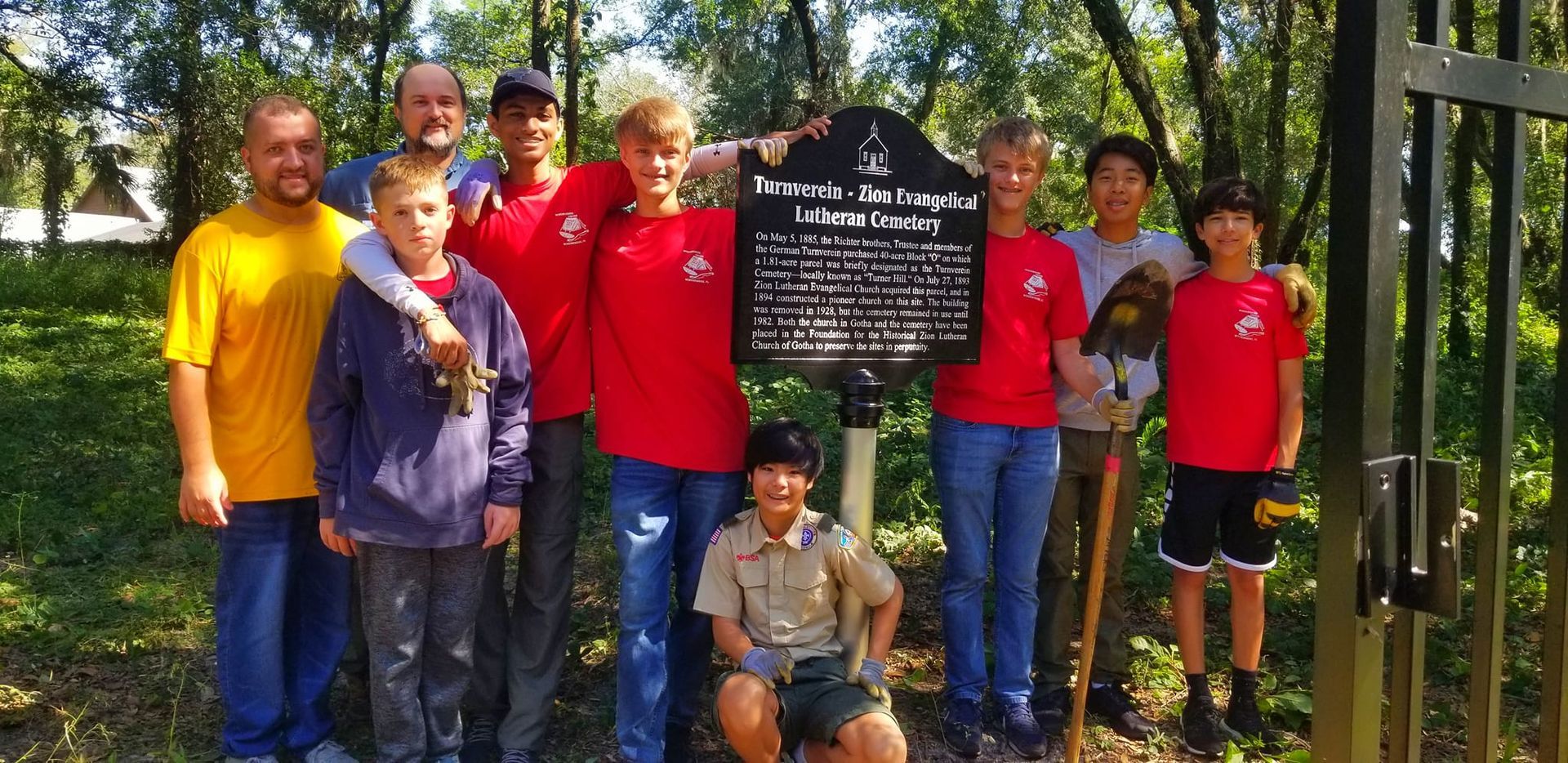 BSA Troop 22 takes a quick pic after removing invasive plants from the historic Turnverein-Zion Evangelical Lutheran Cemetery.