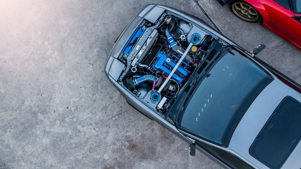 Overhead View of a Silver Car With Its Hood Open — GA Plant & Automotive Repairs In Taminda, NSW