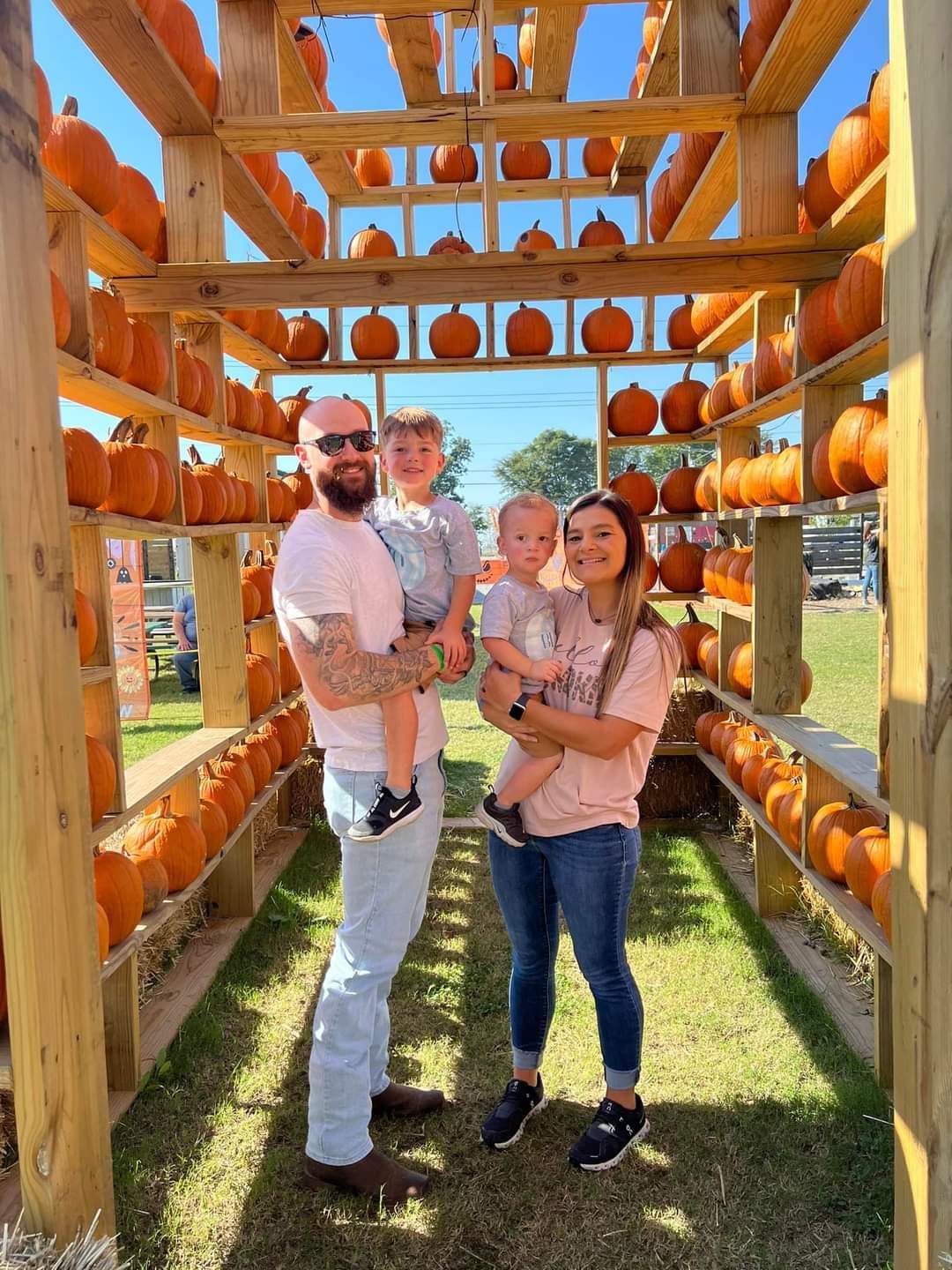 A family is posing for a picture at River City Adventure Park in Caruthersville Missouri.