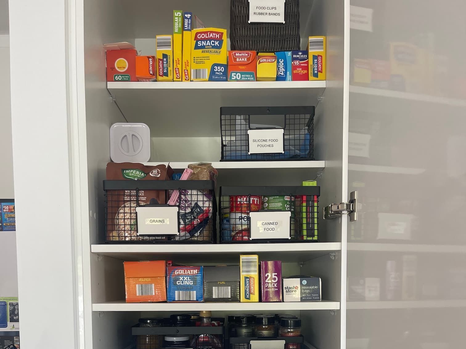 A pantry with organisers in it
