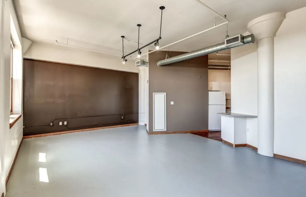 Living room with view of kitchen