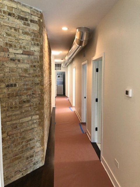 Tiffany Main Apartments lobby hallway to units.