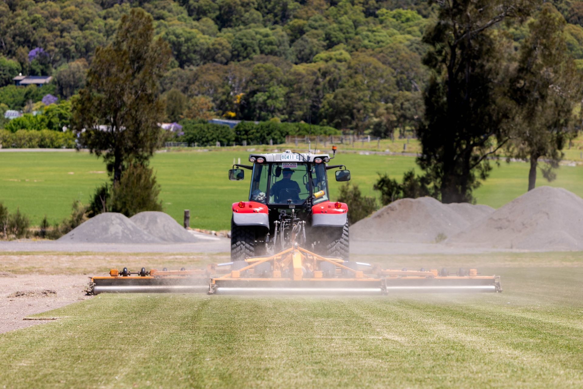 red tractor on Kenda Kikuyu Turf 