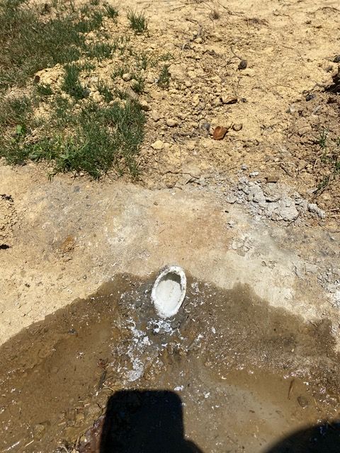 a defective drainage that caused puddle of water on the ground.