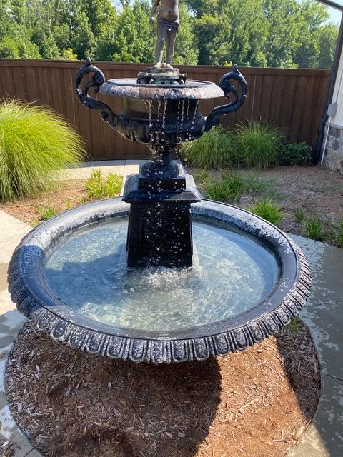 A newly installed fountain in the backyard.