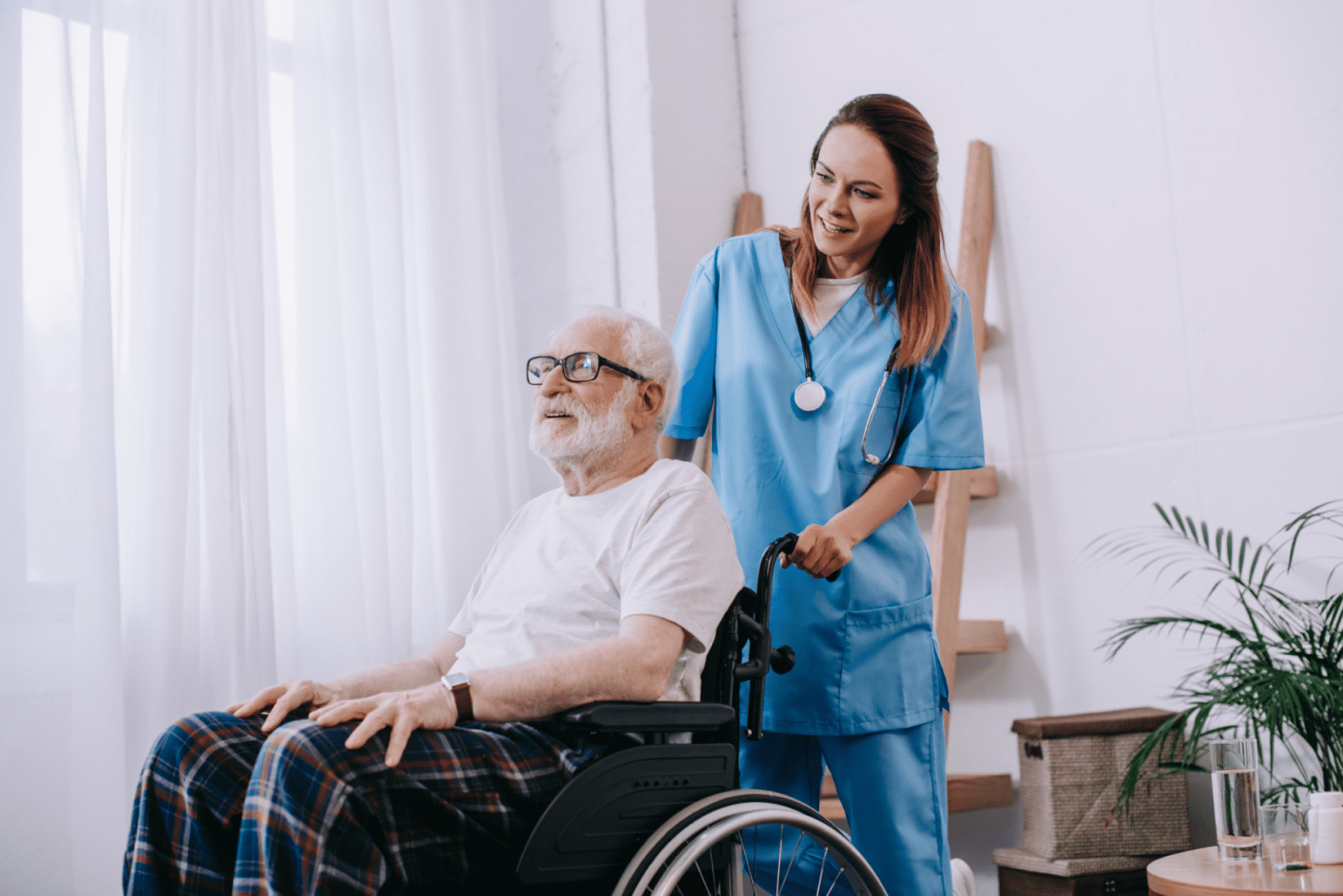 Home health nurse caring for senior patient at home