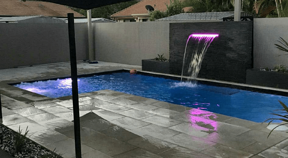 Pool with a Water Feature — Swimming Pools And Spas in Townsville, QLD