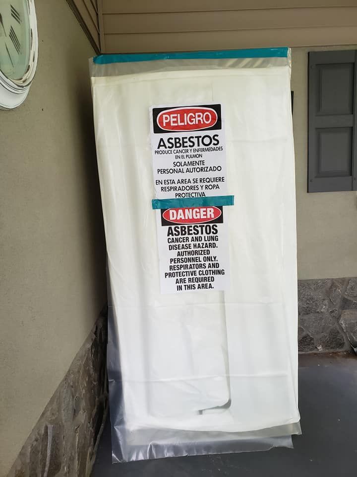 A white bag with a danger sign on it