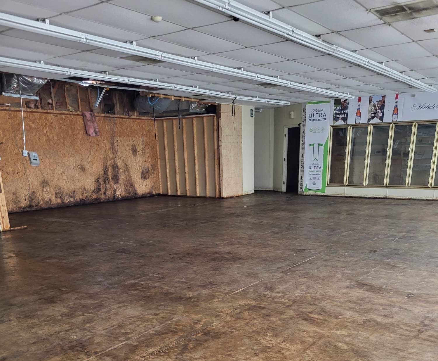 An empty room with a sign that says ' a ' on it