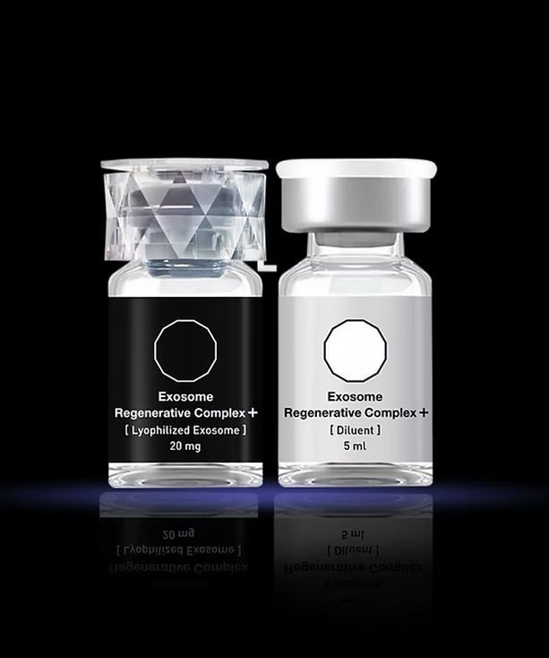 Two vials of Exosome Regenerative Complex+ medicine on a black reflective surface.