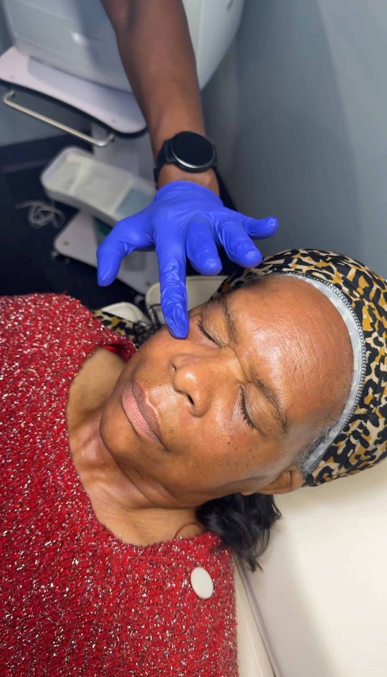 Close-up of a person's brown eye with long eyelashes.