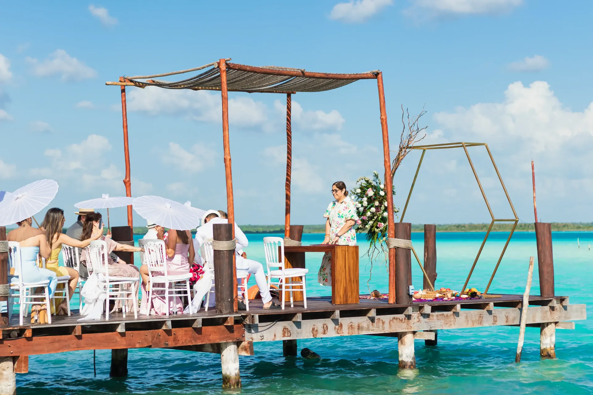 A beach with chairs and umbrellas on it
