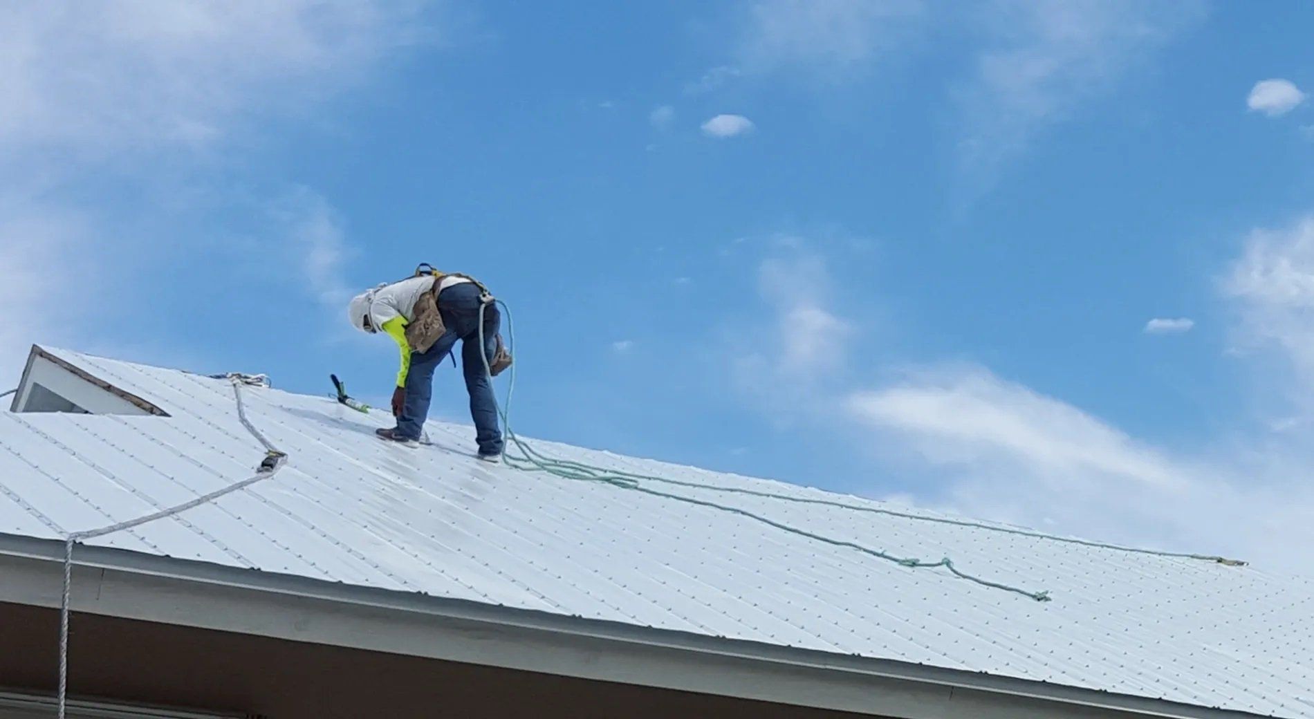 Guy Working on Metal Roof — Key West, FL — Keys All Area Roofing & Construction
