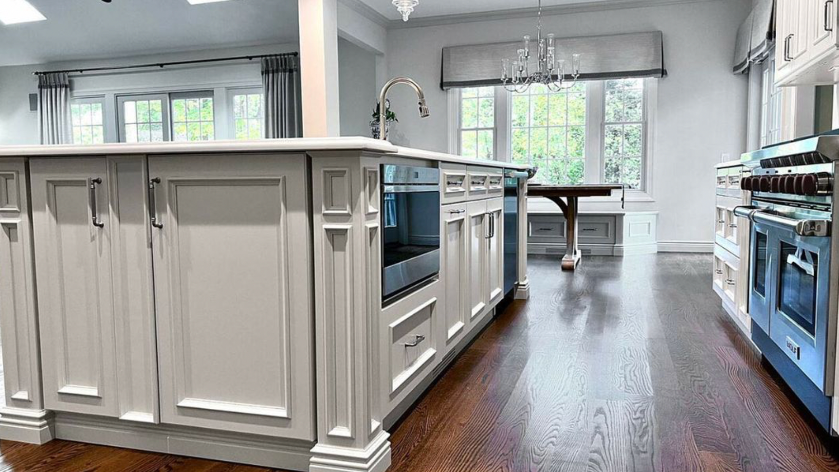 There is a large island in the middle of the kitchen.