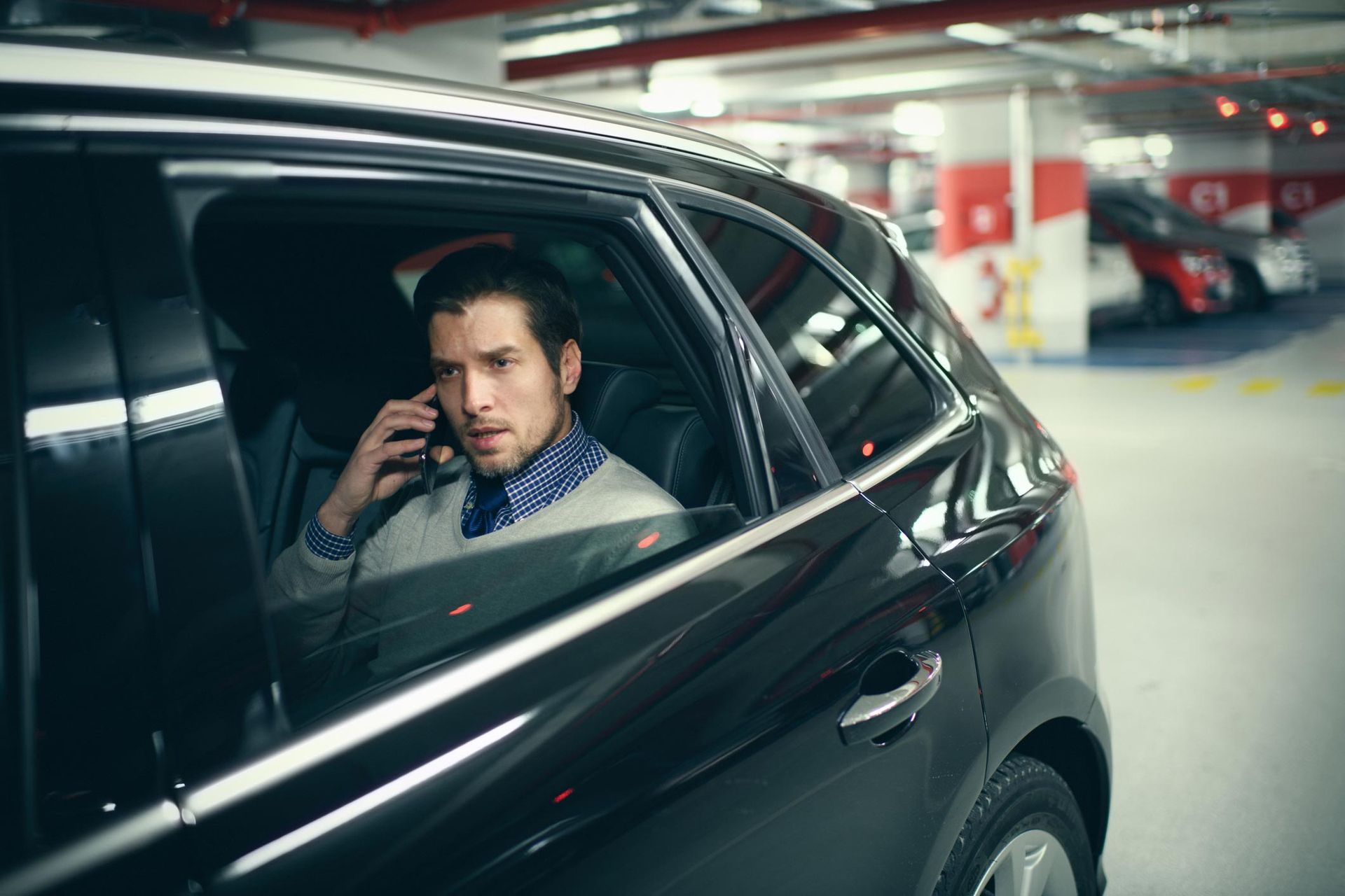 Man In Car Calling — Louisville, KY — Ambassador Capital Limousine