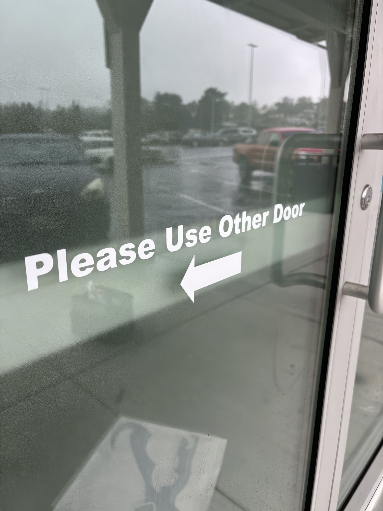 Sign on glass door: