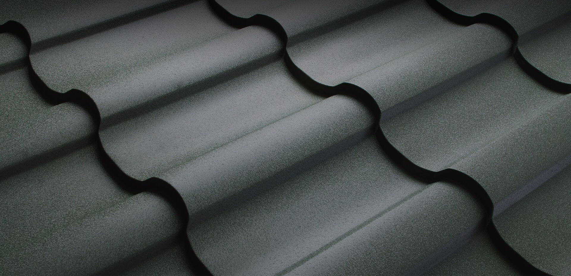A close up of a black roof tile