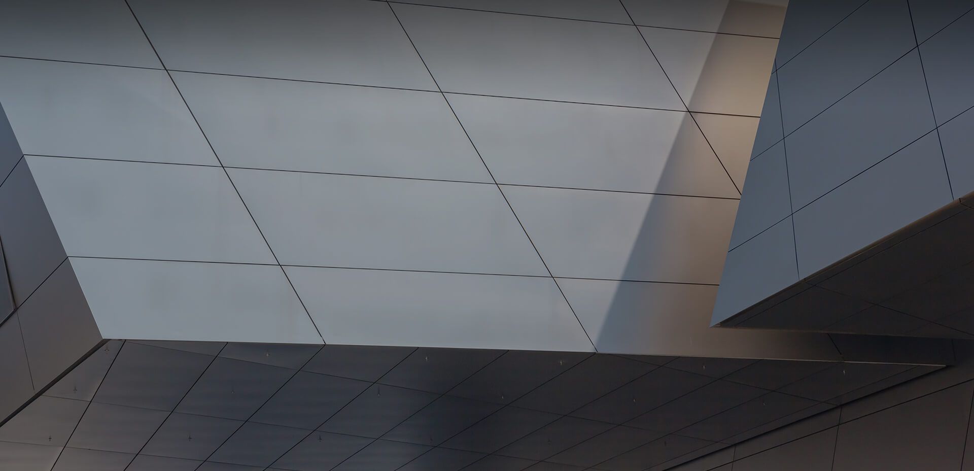 A close up of a ceiling with a grid pattern on it.