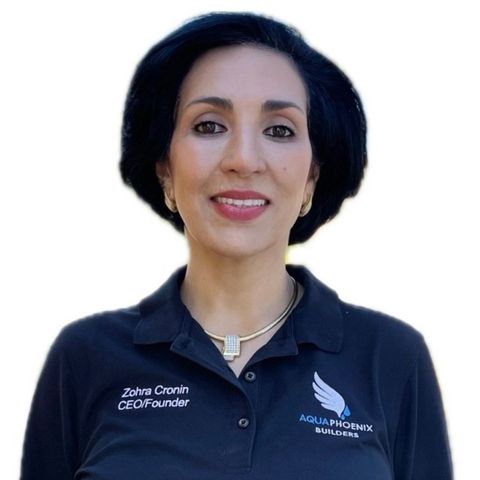 Zahra Cronin, CEO/Founder of Aqua Phoenix, smiling, wearing a black polo shirt with company logo.