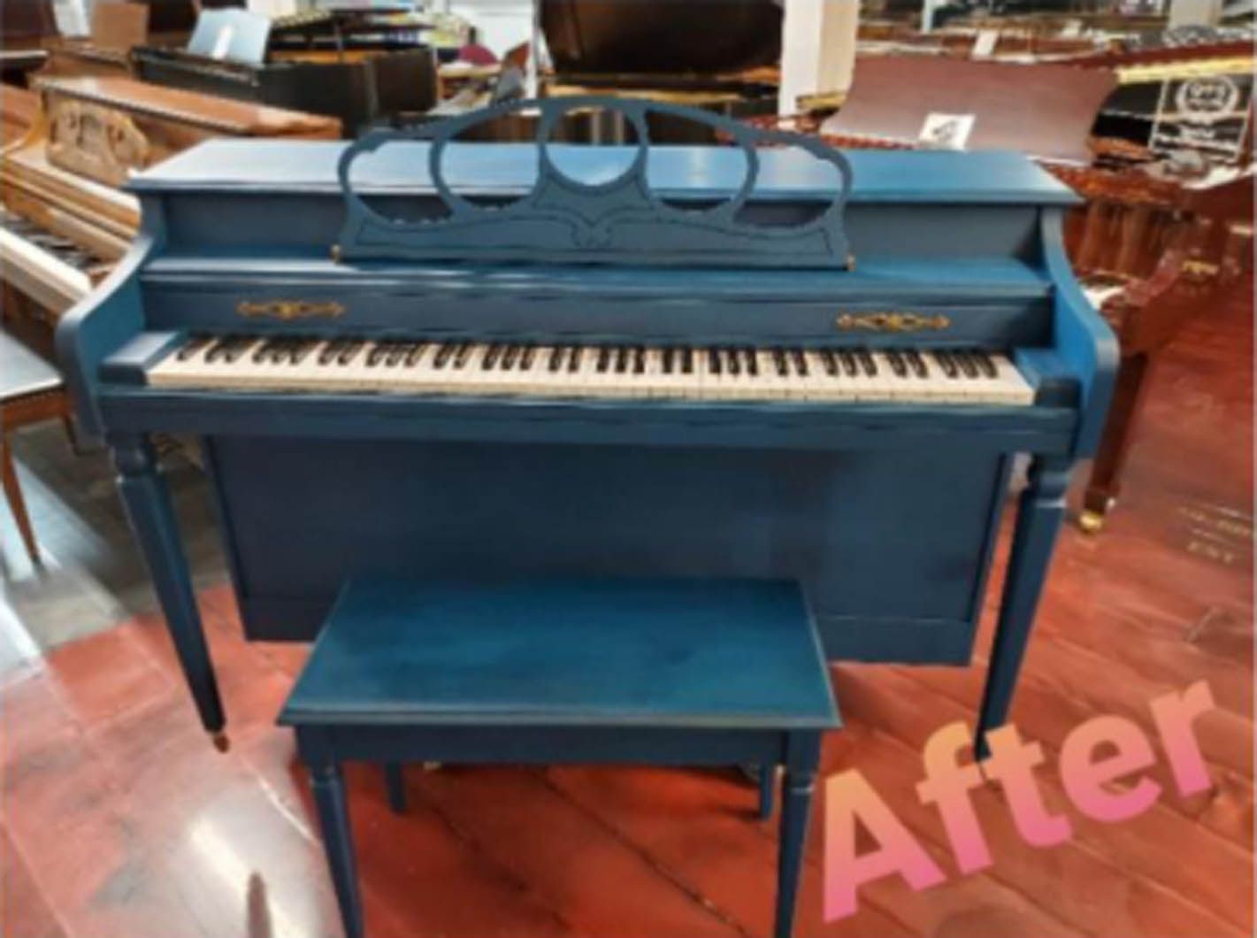 A blue piano with a bench next to it and the words after written on the bottom