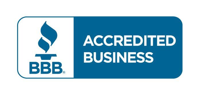 The bbb logo is blue and white and says accredited business.