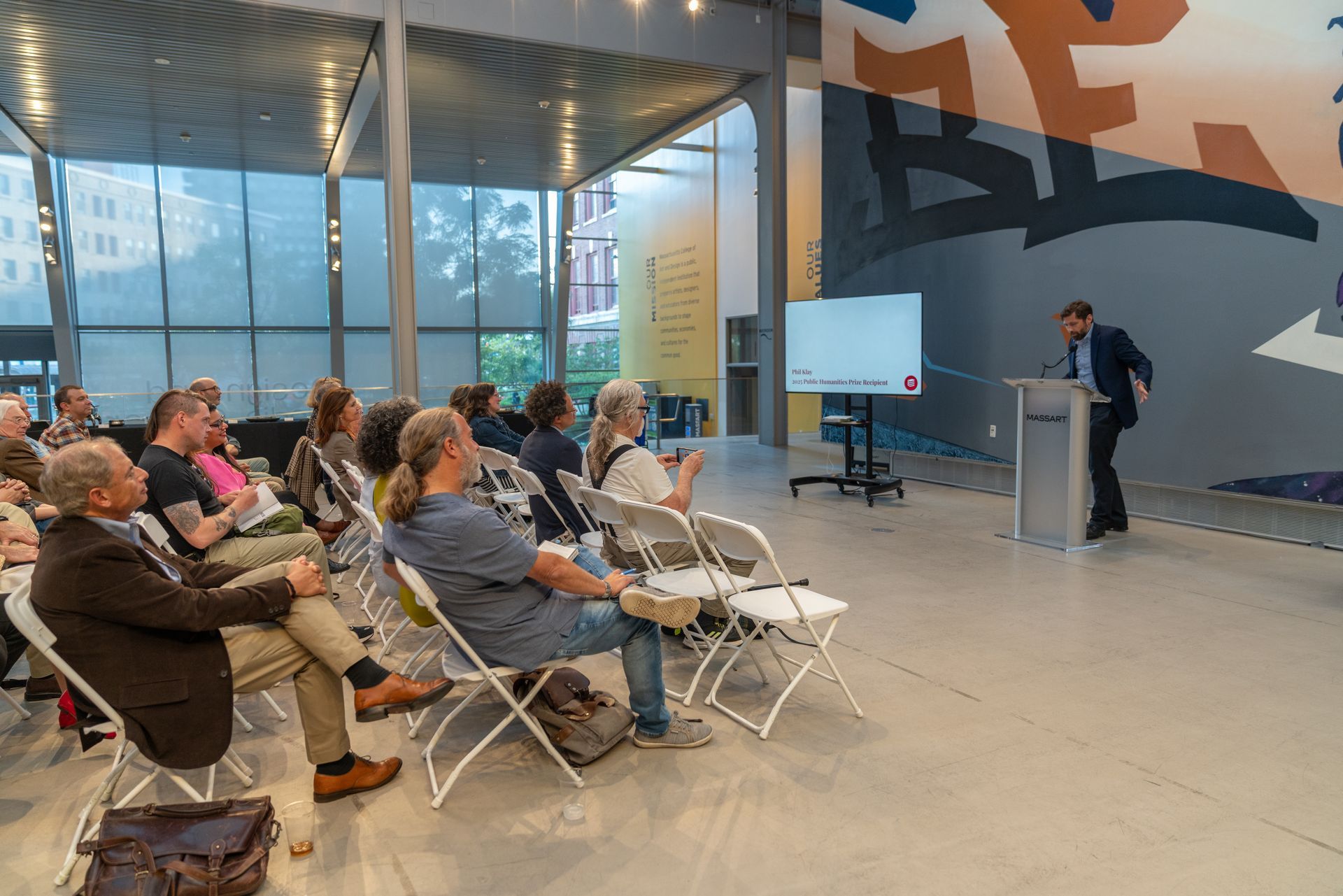 Black and white headshot of author Phil Klay