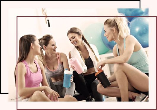 four female adults socializing after exercise
