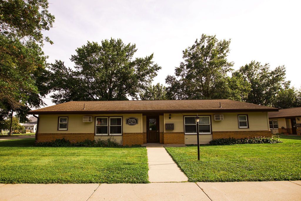 A house with a sign that says ' a ' on it