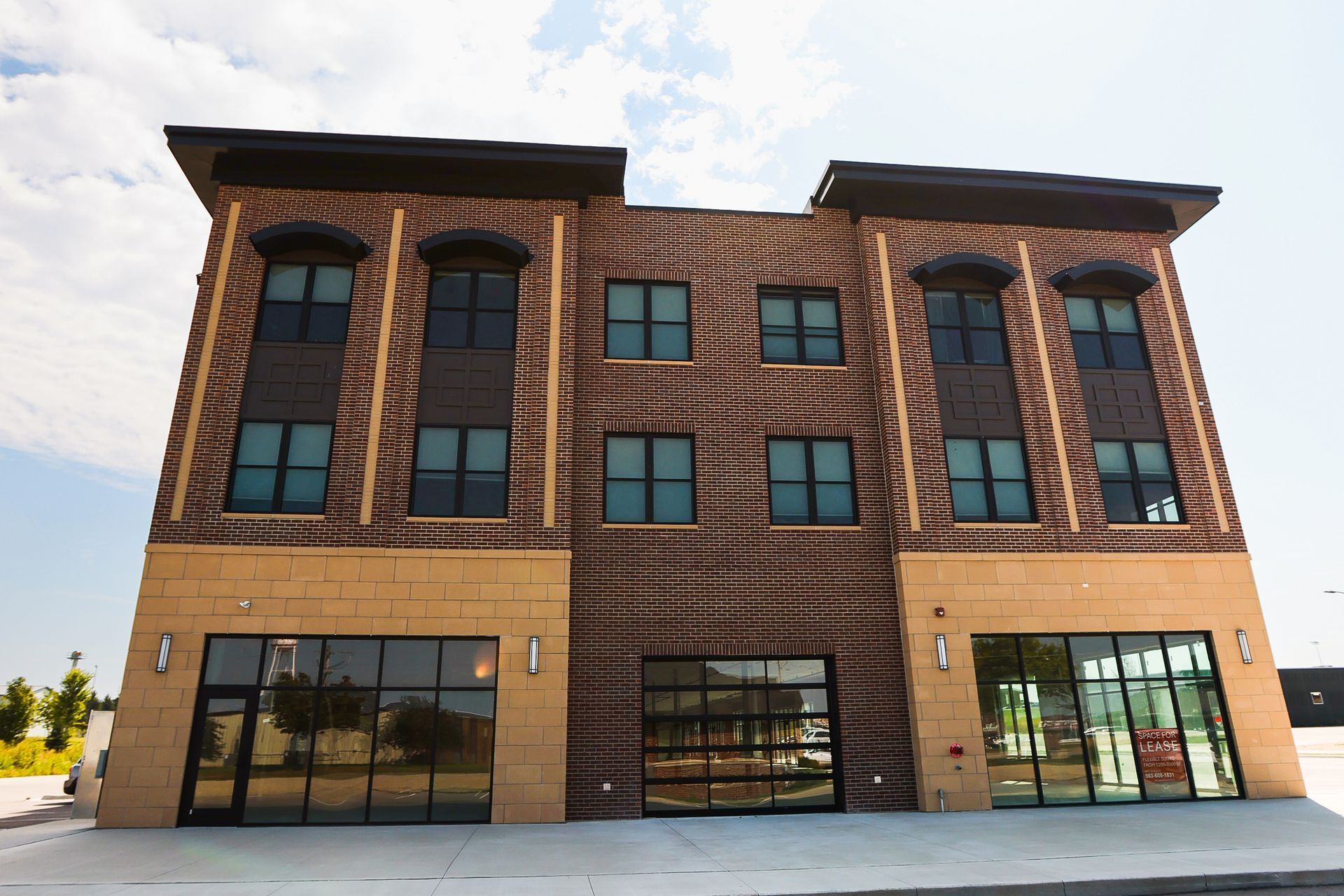 A large brick building with a lot of windows