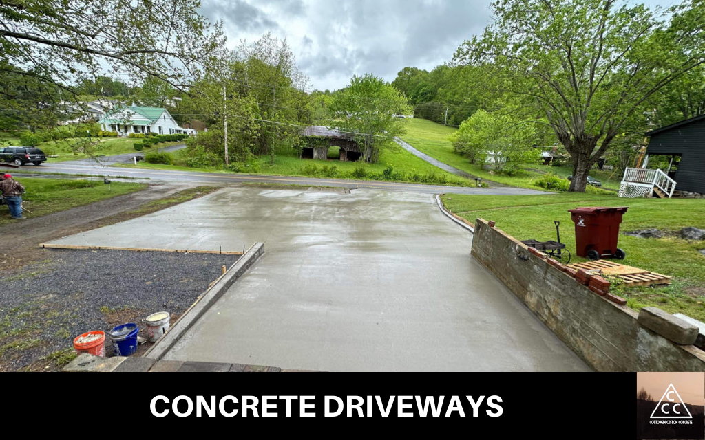 image of a new concrete driveway in memphis, with text underneath that says concrete driveway services, and the Cancino Concrete logo on the bottom right