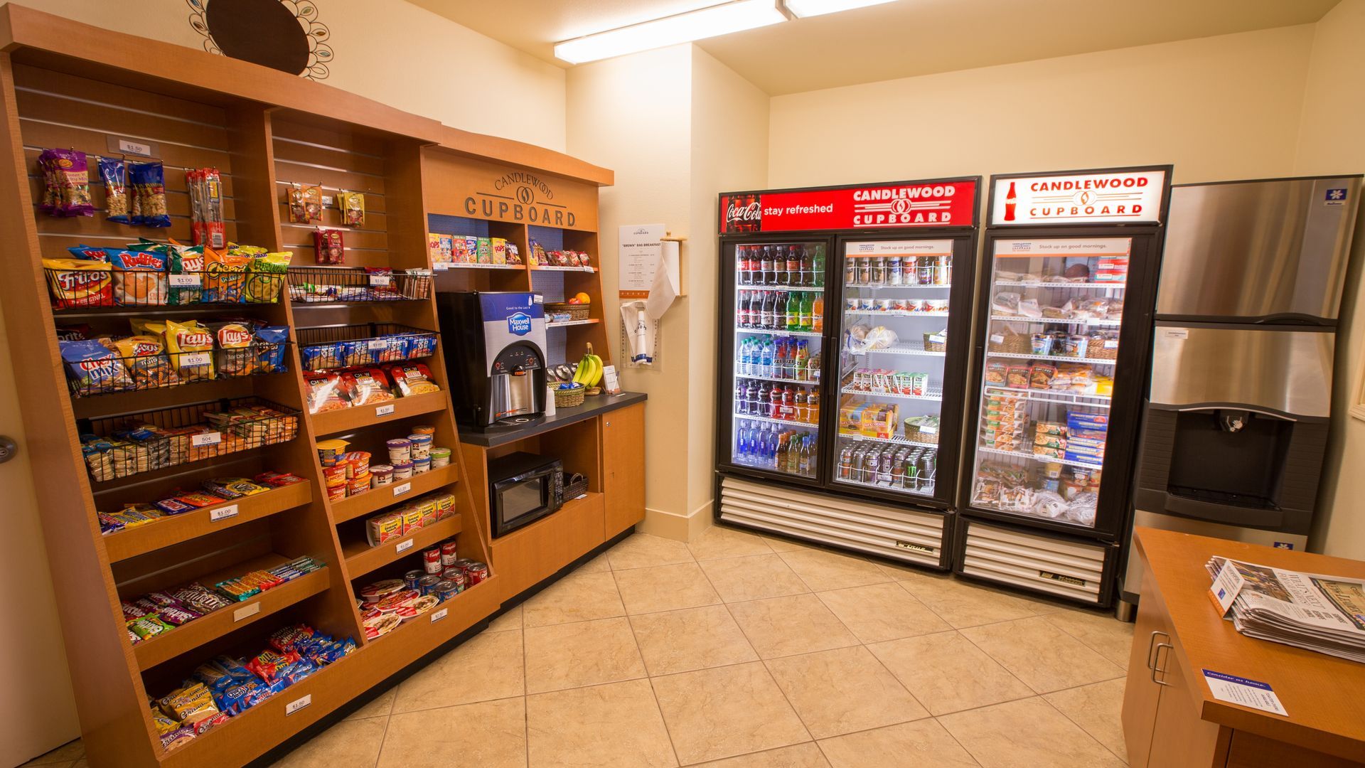 Candlewood Cupboard shelves stocked with snacks, meals, and essentials