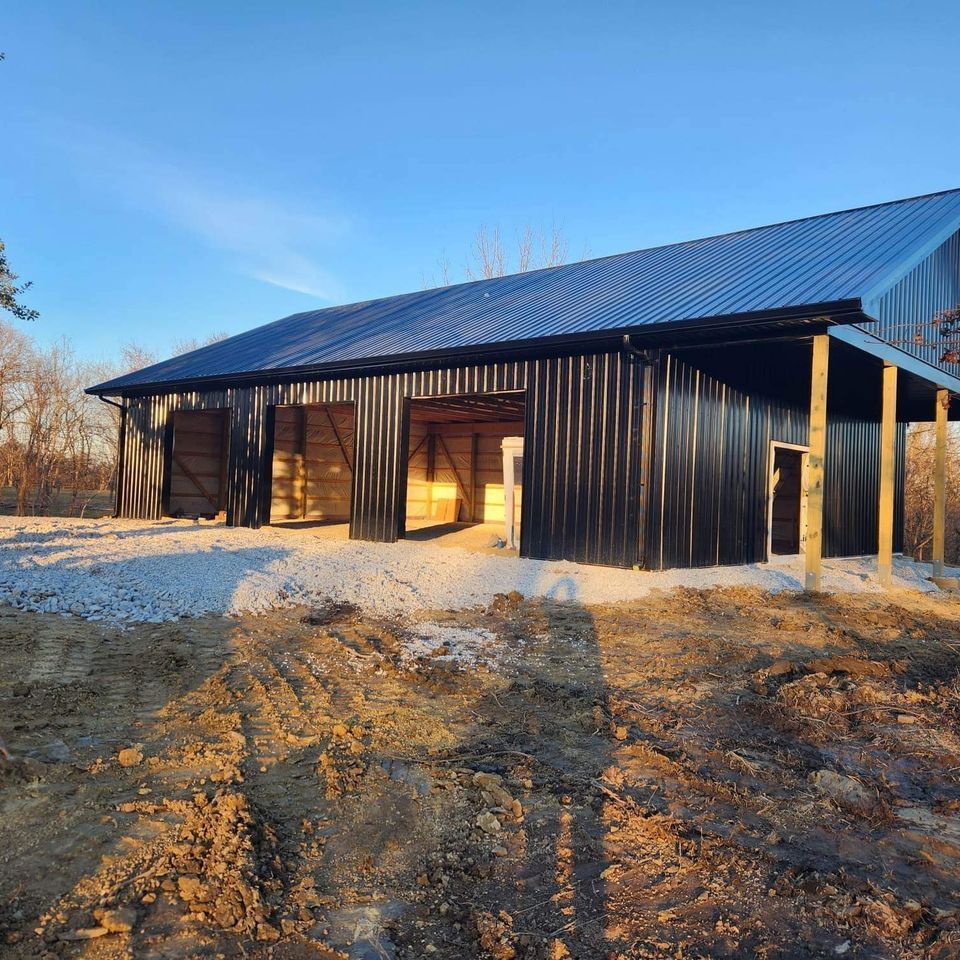 Nolan Construction building and erecting a 40' x 60' x 15' post frame building from foundation to dry-in in Waco, KY.