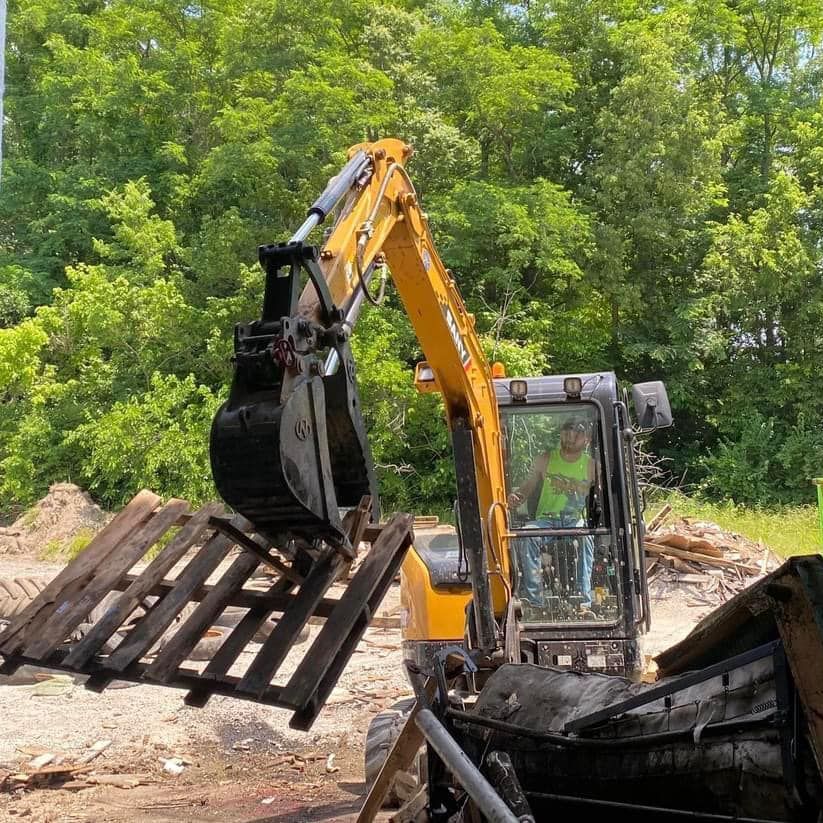 Nolan Construction removing trash and debris from a client warehouse in order to begin rehabilitation of the interior.