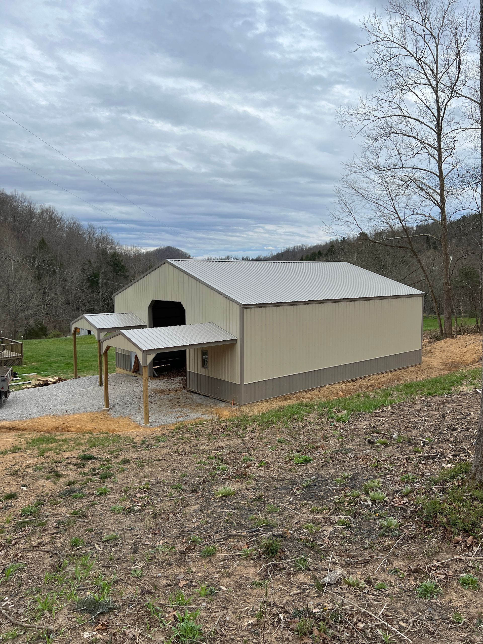 Nolan Construction building and erecting a 40' x 50' post frame building on a customer's home lot.