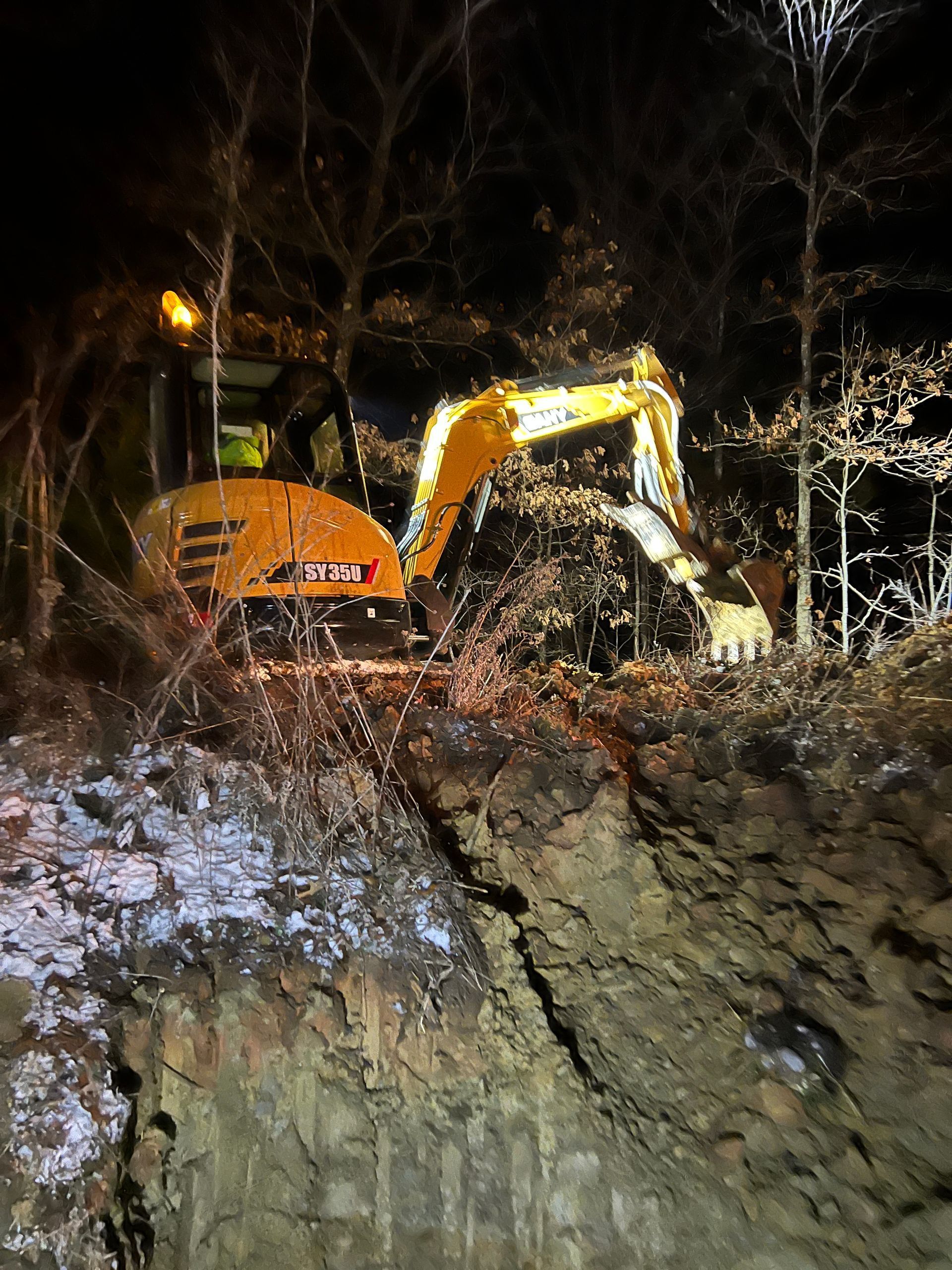 Nolan Construction digging and locating a section of main line that had frozen and busted in order to be replaced.