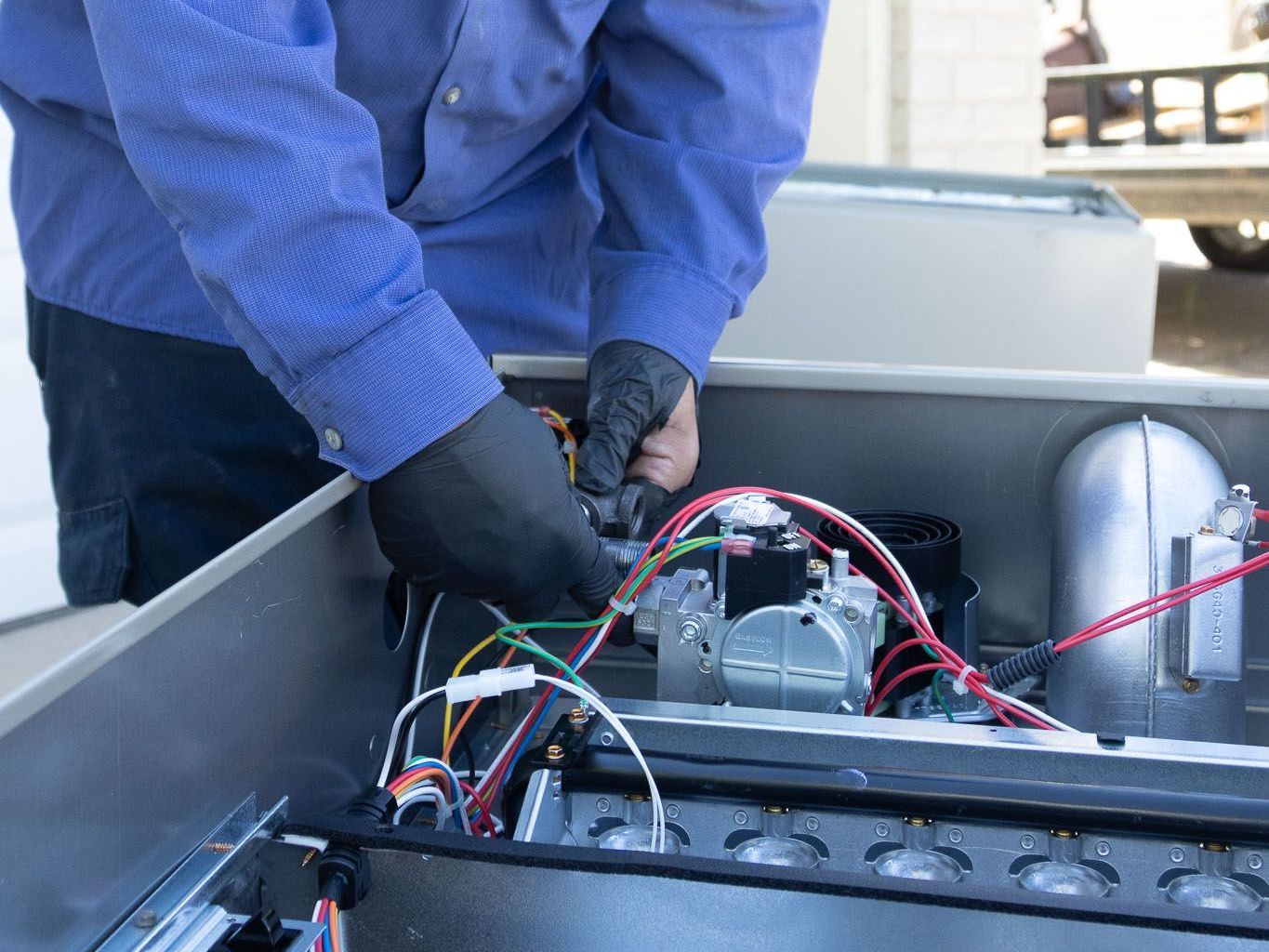 R.A. Biel employee providing preventive maintenance