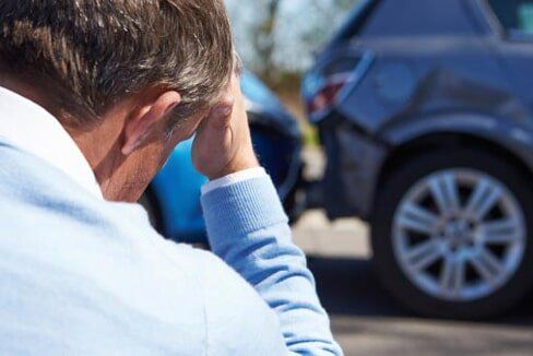 Stressed Driver After Traffic Accident - Auto Insurance - Roth Insurance in Staten Island, NY