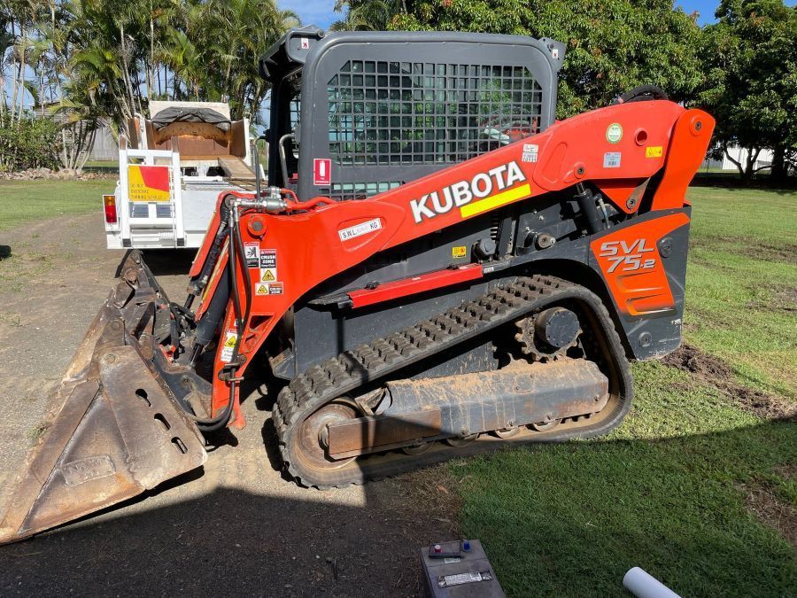 A Kubota Bulldozer is Parked on the Side of the Road — Upgrade Earthworks In South Kolan, QLD